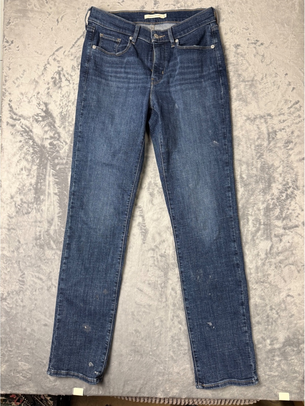 Levi's Classic Blue Denim Jeans with Distressed Details